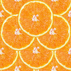 Seamless pattern of juicy slices of orange in the form of tiles. Design for packaging and backgrounds.