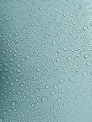 Water droplets on the glass background