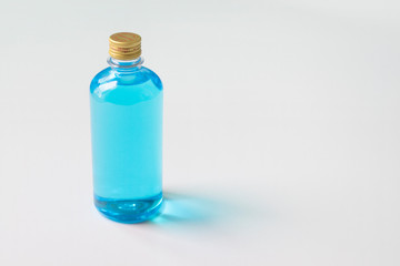 Glasses, alcohol-based hand sanitizers, 70% isopropyl alcohol, must have items product during the COVID- 19 pandemic, isolated on white background.