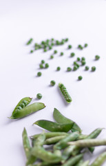 Healthy fresh green peas top view flat lay with white background. 