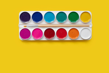 watercolor package on a yellow background
