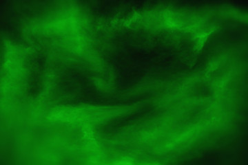 Obraz na płótnie Canvas blurry green smoke with dark atmosphere,abstract background,