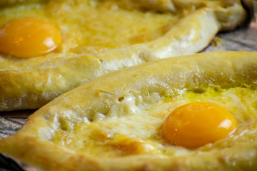 The process of preparing the Caucasian delicacy khachapuri.