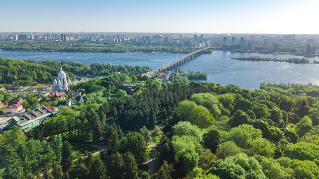 Aerial top view of Kiev city from above, Kyiv skyline and Dnieper river cityscape in spring, Ukraine
