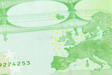 detail of a 100 euro bank note first edition reverse