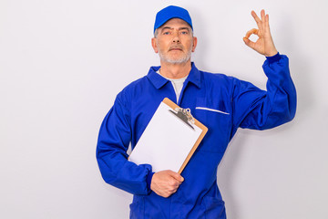 technician or professional with approval gesture isolated on white background