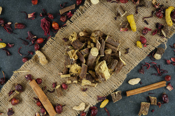 Licorice or liquorice root sticks isolated on dark or textille background stock photo