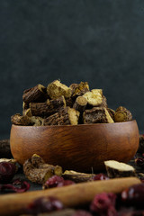 Licorice or liquorice root sticks isolated on dark or textille background stock photo