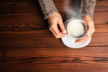 a female hands and coffee