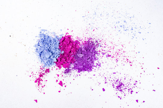 Blue Purple and Pink crushed eye shadow isolated on white background.