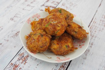 Deep fried potato patty also known as Begedil. It is a traditional Malays and Javanese food. Begedil also popular in Malaysia, Indonesia and Singapore. Delicious food and tasty.
