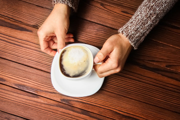 a female hands and coffee