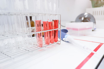 Cropped shot view of  the equipment and science experiments in Laboratory, Chemical substances for research and analyzing a sample under the microscope in laboratory.   