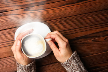 a female hands and coffee
