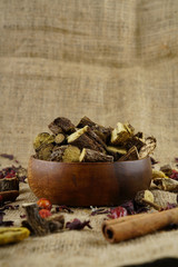 Licorice or liquorice root sticks isolated on dark or textille background stock photo