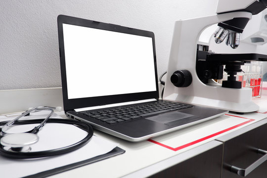 Cropped shot view of  the equipment and science experiments in Laboratory, Chemical substances for research and analyzing a sample under the microscope in laboratory.   