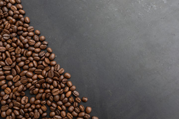 coffee bean on black wooden table background. top view
