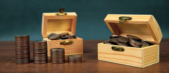 Many coins are stacked in a graph shape for money saving ideas and financial planning insurance.