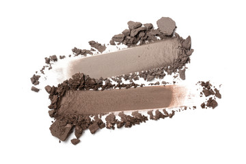 Close-up of make-up swatch. Smear of crushed gray and brown eye shadow