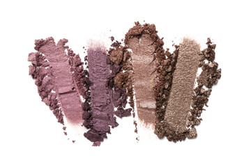 Close-up of make-up swatch. Smear of crushed brown and purble eye shadow