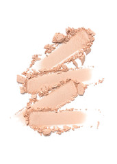 Close-up of make-up swatch. Smear of crushed beige face powder