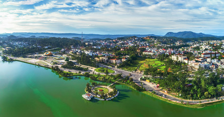 
Top view aerial photo from flying drone of a Da Lat City with development buildings, transportation. Tourist city in developed Vietnam.
