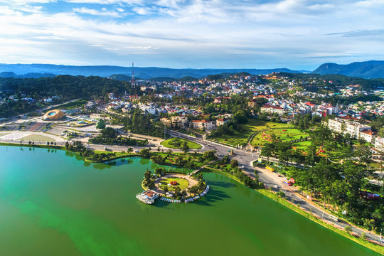 
Top view aerial photo from flying drone of a Da Lat City with development buildings, transportation. Tourist city in developed Vietnam.
