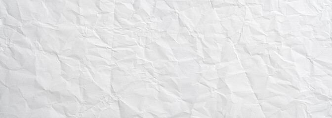 Texture of a white crumpled sheet of paper as a background