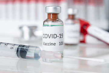 Nobel coronavirus covid-19 vaccine vial a illustrative picture, doctor in the laboratory with a biological tube for analysis and sampling of Covid-19 infectious disea.