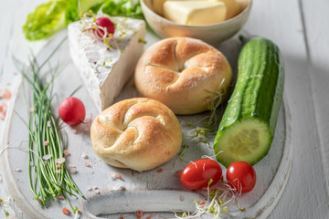 Preparation for sandwich with fresh vegetables, cheese and herbs