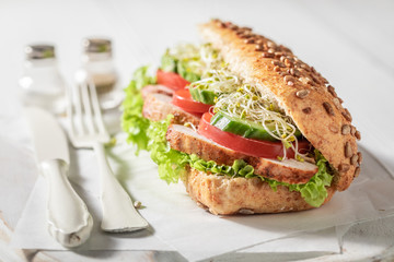 Homemade and tasty sandwich with grilled chicken and vegetables