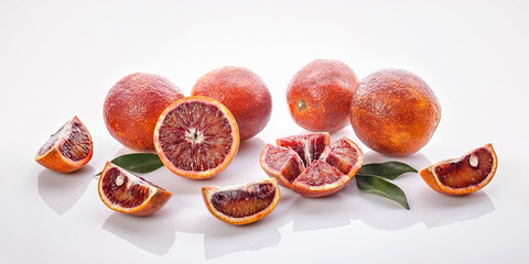 Food banner. Juicy red Sicilian orange on a white background. Seasonal Citrus Fruits