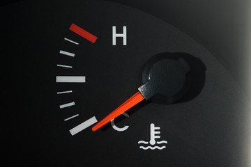 The car's coolant temperature indicator on the dashboard, a little color, shows the minimum...