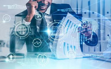 African man on phone in office, online business