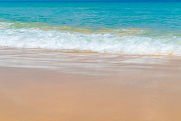 Fototapeta na wymiar Sea wave white sand beach summer vacation