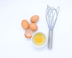 Close-up view of raw chicken eggs on background