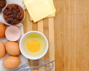 Close-up view of raw chicken eggs on background