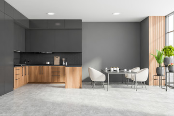 Wooden and grey kitchen with table