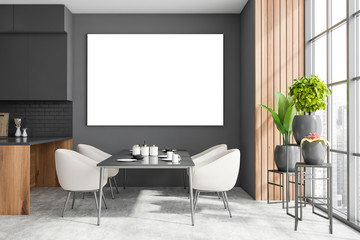 Gray and wooden dining room interior with poster