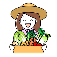 野菜の詰め合わせセットを持っている女性