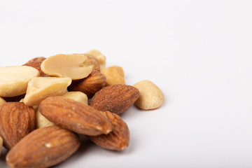 Healthy nuts on White Background. Nuts are a snack food consisting of any mixture of mechanically or manually combined nuts.
