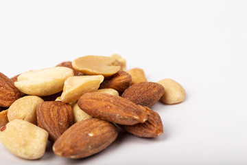 Healthy nuts on White Background. Nuts are a snack food consisting of any mixture of mechanically or manually combined nuts.