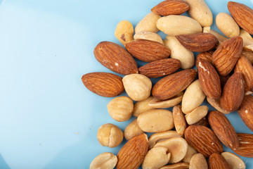 Healthy nuts on White Background. Nuts are a snack food consisting of any mixture of mechanically or manually combined nuts.