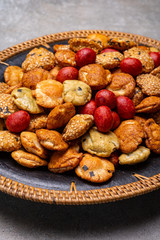 Tasty asian vegetarian appetizer, crunchy rice en peanuts snacks from Japan