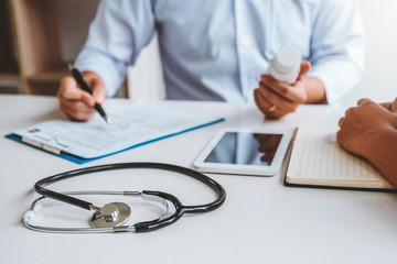 Doctors and patients Consulting about Treatment guidelines at office