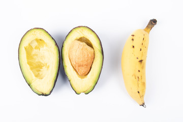 Fresh Avocado with banana on white background. Healthy Fruit Concept.