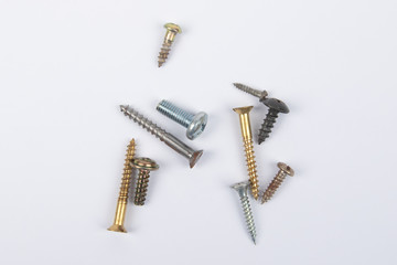 different set screws in a row on white background
