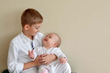 Big brother and his little baby sister.  Friendship between brother and sister. Best friends forever. Happy friendship Day. Beautiful relationships of the world. Sibling love portrait. Happening