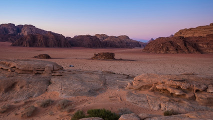 Fototapeta na wymiar red desert with rocks Wadi Rum in Jordan on the Sunset