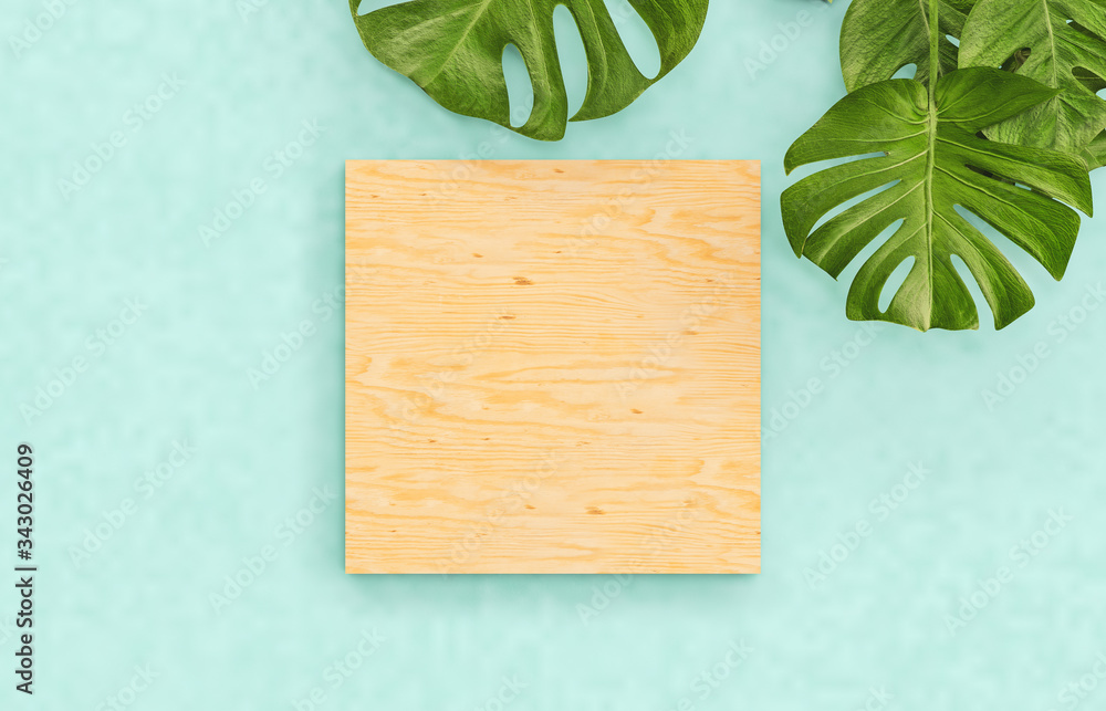 Poster natural empty cube box on summer vivid color background with tropical palm leaves. for cosmetic prod